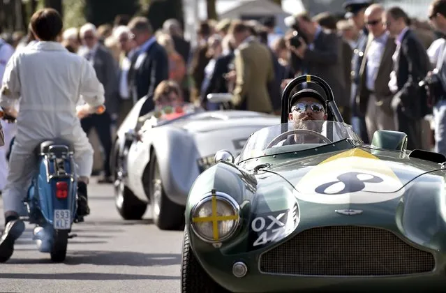 Visitors and car enthusiasts attend the Goodwood Revival historic motor racing festival in Goodwood, near Chichester in south England, Britain, September 11, 2015. (Photo by Toby Melville/Reuters)