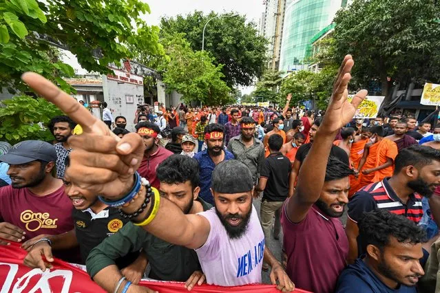 Sri Lankan university students take part in a demonstration in Colombo on August 18, 2022. (Photo by Ishara S. Kodikara/AFP Photo)