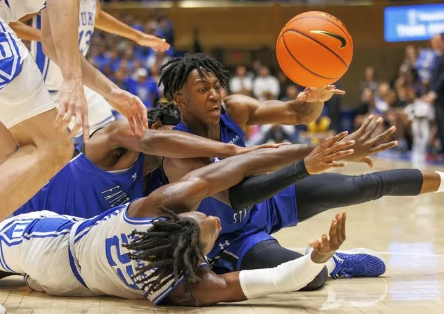 Fayetteville State's Isaiah Ray, right, and Duke's Mark Mitchell (25) battle for a loose ball during the first half of an NCAA college basketball exhibition game in Durham, N.C., Wednesday, November 2, 2022. (Photo by Ben McKeown/AP Photo)