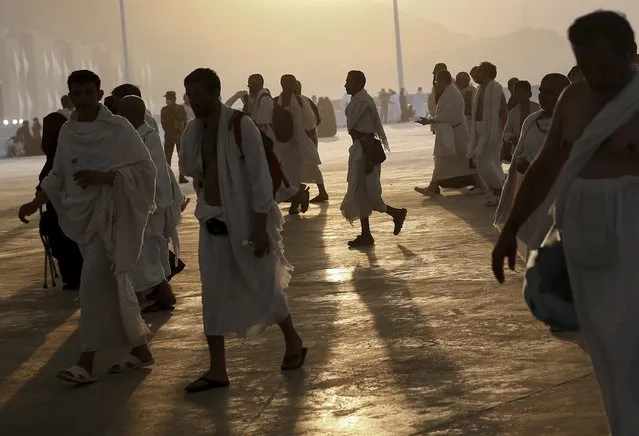Muslim pilgrims arrive to cast stones at pillars symbolizing Satan during the annual haj pilgrimage in Mina on the first day of Eid al-Adha, near the holy city of Mecca September 24, 2015. (Photo by Ahmad Masood/Reuters)