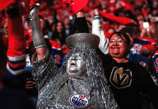 Fans cheer as the Los Angeles Kings and the Edmonton Oilers prepare for an NHL playoff hockey game in Edmonton, Alberta, Sunday, April 27, 2025. (Photo by Jason Franson/The Canadian Press via AP Photo)