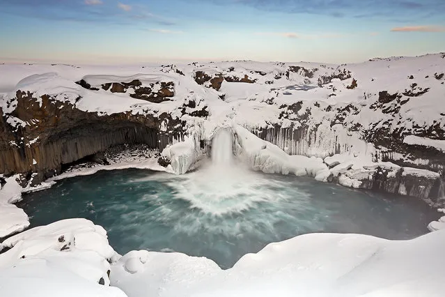 “The Cathedral”. I dreamed of shooting the best waterfalls in Iceland just before the spring snowmelt. Towards the end of winter I only could reach Aldeyjarfoss waterfall by using a super jeep and a snowmobile. Once there I could enjoy one of the most striking views in all Iceland. The river Skjálfandafljót flows under the ice sheet and jumps over a magnificent wall of hexagonal basalt columns which reach twenty metres in height. Photo location: Valley of Bárðardalur, Iceland. (Photo and caption by Cristobal Serrano/National Geographic Photo Contest)