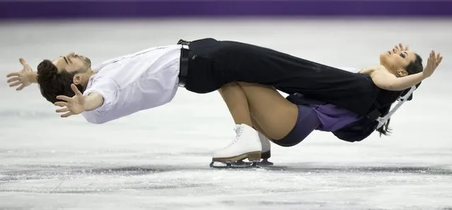 Sara Hurtado and Adria Diaz, of Spain, perform their free skate program in the ice dance competition at the World Figure Skating Championships, Saturday, March 16, 2013, in London, Ontario. (Photo by Paul Chiasson/AP Photo/The Canadian Press)