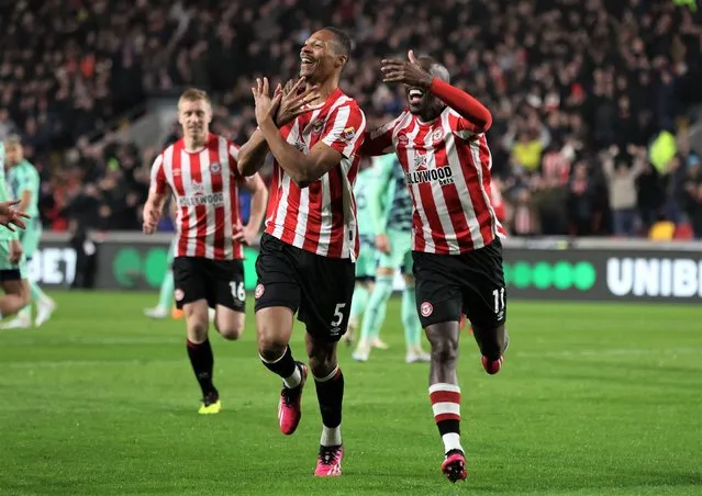 Ethan Pinnock of Brentford celebrates after scoring the opening goal during the Premier League match at Gtech Community Stadium, London on March 6, 2023. (Photo by Paul Terry/ Sportimage/Alamy Live News)