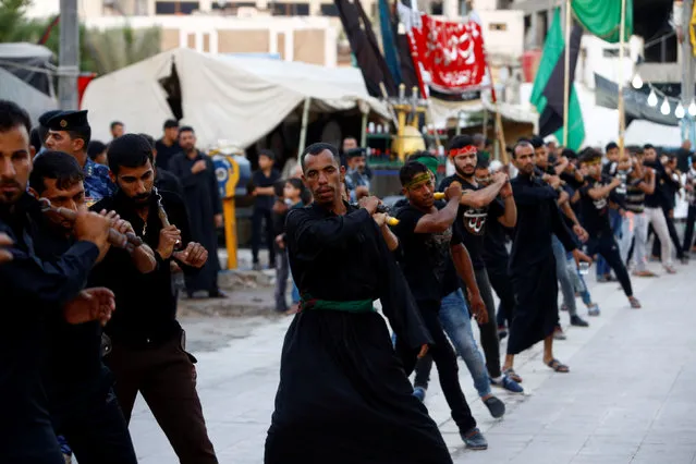 Shi'ite Muslims commemorate Ashura in Najaf, Iraq  October 10, 2016. (Photo by Alaa Al-Marjani/Reuters)