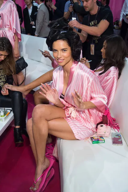Adriana Lima appears backstage preparing for the 2015 Victoria Secret Fashion Show taping at the Lexington Armory on Tuesday, Nov. 10, 2015, in New York. The Victoria's Secret Fashion Show will air on CBS on Tuesday, December 8 at 10pm EST. (Photo by Charles Sykes/Invision/AP Photo)