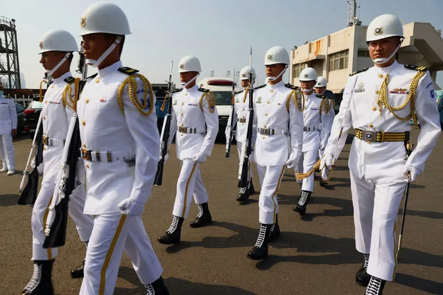 Navy Honor Guards are seen at the ceremony for the start of construction of a new submarine fleet in Kaohsiung, Taiwan, November 24, 2020. (Photo by Ann Wang/Reuters)
