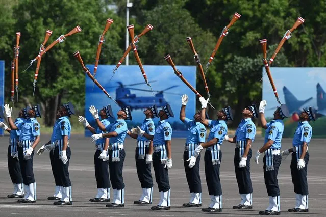 Indian Air Force (IAF) personnel perform an air warrior drill after a graduation ceremony in Dundigal, on the outskirts of Hyderabad on June 17, 2023. (Photo by Noah Seelam/AFP Photo)
