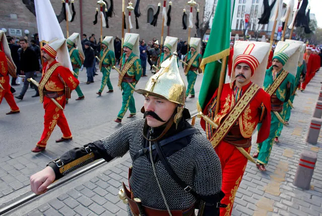 Turkish soldiers in historical Ottoman janissary outfits, march during a ceremony, one of many marking the 743rd anniversary of the death of Mevlana Jalaluddin Rumi, in Konya, Turkey, December 7, 2016. (Photo by Murad Sezer/Reuters)