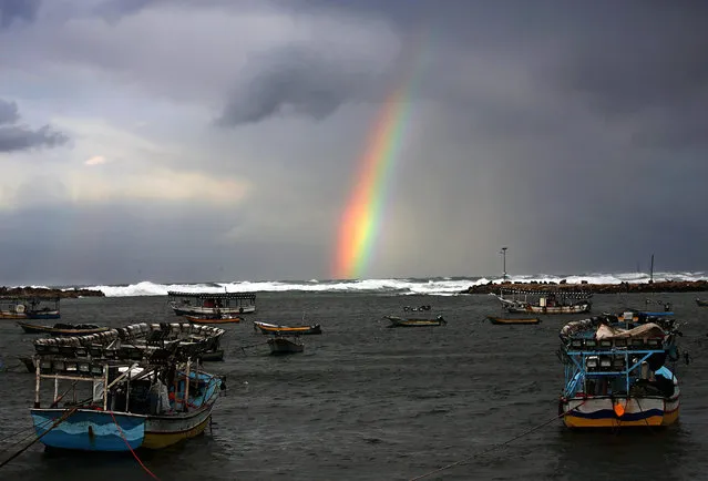 A rainbow seen from the Gaza port over Gaza City, during rain the Gaza Strip, 14 December 2016. (Photo by Mohammed Saber/EPA)