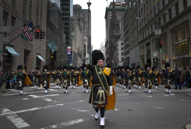 The New York City Police Emerald Society pipe and Drum Corps marches in the 254th New York City St. Patrick's Day parade up 5th Avenue in the Manhattan Borough of New York, March 17, 2015. (Photo by Mike Segar/Reuters)