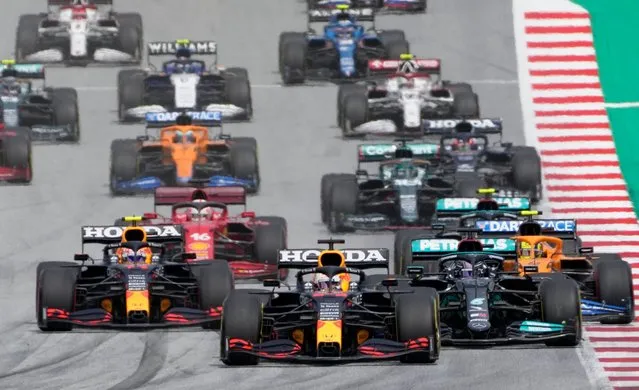 Red Bull driver Max Verstappen, centre, of the Netherlands leads ahead during the Styrian Formula One Grand Prix at the Red Bull Ring racetrack in Spielberg, Austria, Sunday, June 27, 2021. (Photo by Darko Vojinovic/AP Photo)