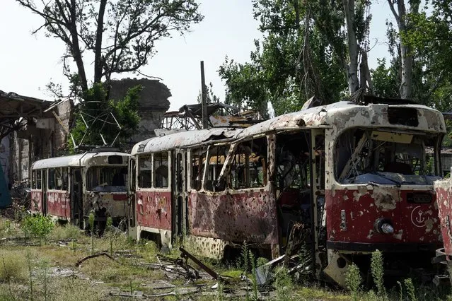 Destroyed trams are pictured in the city of Mariupol on August 1, 2022, amid the ongoing Russian military action in Ukraine. (Photo by AFP Photo/Stringer)
