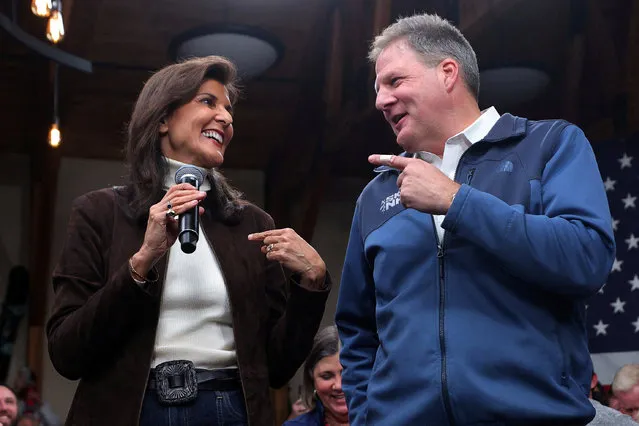 Republican presidential candidate and former U.S. Ambassador to the United Nations Nikki Haley is endorsed by New Hampshire Governor Chris Sununu at a campaign town hall in Manchester, New Hampshire on December 12, 2023. (Photo by Brian Snyder/Reuters)