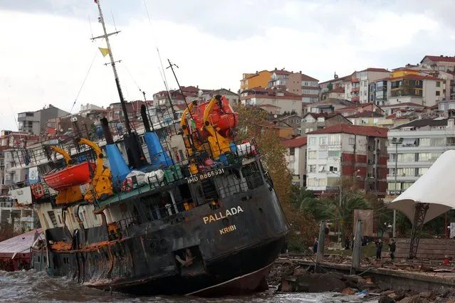 A view of the stranded cargo ship that drifted due to the storm in Eregli district of Zonguldak, Turkiye on November 20, 2023. The Panama-flagged cargo ship was split in two due to the storm that was effective in the region. (Photo by Omer Urer/Anadolu via Getty Images)