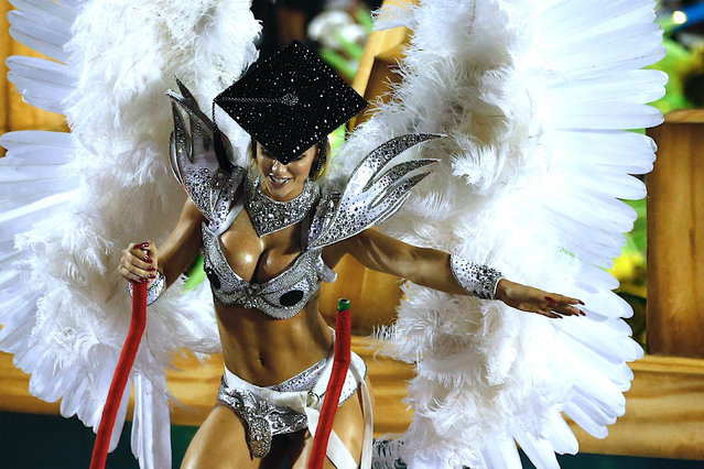 A member of the samba school of the Grupo Especial Academicos do Grande Rio parade during the Carnival celebration at the Marques de Sapucai sambadrome in Rio de Janeiro, Brazil, early 04 March 2019. The samba schools of the Rio de Janeiro Special Groups began their parades on 03 March at the sambadrome, considered the main attraction of the carnival in Brazil. (Photo by Marcelo Chello/EPA/EFE)