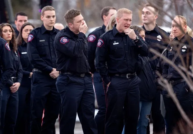 Firefighters, paramedics and other first responders gather after a planned procession for the firefighter and paramedic Adam Finseth in Burnsville, US on February 19, 2024. Finseth and two police officers were shot and killed early on Sunday and a third officer was injured at a suburban home in an exchange of gunfire while responding to a call involving an armed man who had barricaded himself inside with family. (Photo by Carlos Gonzalez/AP Photo)