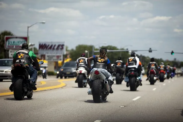 Bikers cruise down Kings Highway during the 2015 Atlantic Beach Memorial Day BikeFest in Myrtle Beach, South Carolina May 22, 2015. (Photo by Randall Hill/Reuters)