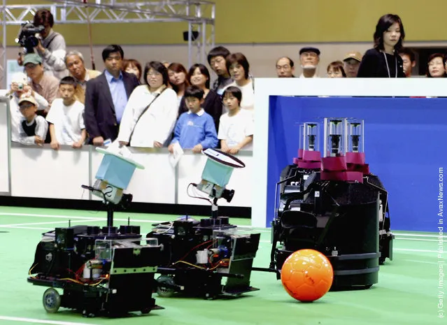 Small size robots in action during the Robocup