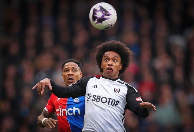 Willian of Fulham chases a loose ball under pressure from Nathaniel Clyne of Crystal Palace during the Premier League match between Fulham FC and Crystal Palace at Craven Cottage on April 27, 2024 in London, England. (Photo by Ryan Pierse/Getty Images) (Photo by Ryan Pierse/Getty Images)