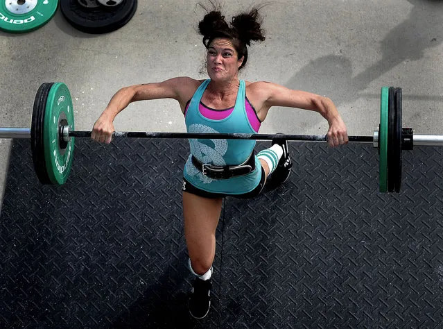 A competitor stresses during CrossFit Integrity,  the Integrity's Revenge Battle of Charleston CrossFit games October 6, 2012 in Charleston, S.C. CrossFit is growing in popularity everyday as even the U.S. Military has integrated it into their physical fitness regime. (Photo by Senior Airman James Richardson/U.S. Air Force)