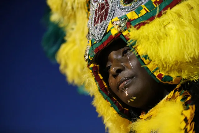 Tonya Johnson, Big Queen of the Wild Tchoupitoulas Indian Tribe, pauses during a vigil at the Triple S Food Mart after the U.S. Justice Department announced they will not charge two police officers in the 2016 fatal shooting of Alton Sterling, in Baton Rouge, Louisiana, U.S., May 2, 2017. (Photo by Jonathan Bachman/Reuters)