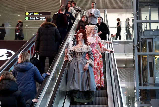 People wearing costumes at Domodedovo International Airport in Moscow Region, Russia on December 5, 2019, on the day of a ceremony to rename it after Russian scientist and polymath Mikhail Lomonosov. On May 31, 2019, the President of Russia signed a decree to add the names of notable Russian people to the names of some 40 airports across Russia following a national vote. (Photo by Stanislav Krasilnikov/TASS)