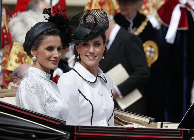 Spain's Queen Letizia and Britain's Kate, the Duchess of Cambridge leave the Order of The Garter Service at Windsor Castle in Windsor, Monday, June 17, 2019. Windsor Castle plays host to the annual Order of the Garter Service, held in St. George's Chapel, which celebrates the traditions and ideals associated with the Most Noble Order of the Garter, the oldest surviving order of chivalry in the world. (Photo by Frank Augstein/AP Photo/Pool)