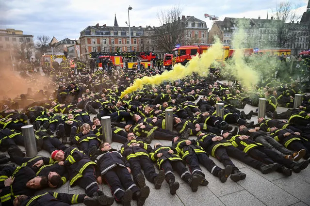 Firefighters take part in a demonstration to protest against the attacks against them during interventions, on January 17, 2020 in Strasbourg, eastern France. During the New Year's Eve night in Strasbourg, two firefighters were notably injured following a projectile thrown onto the window of their truck. Last weekend, three firefighters were victims of a stabbing by a person they came to rescue near Strasbourg. (Photo by Patrick Hertzog/AFP Photo)