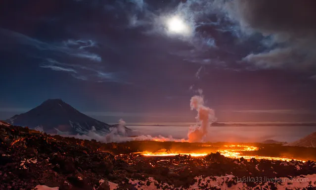 Take a look at this stunning photo of Tolbachik, an active volcanic complex on the Kamchatka Peninsula in far eastern Russia. Lava fountains and rivers ran through the area for months after the eruption began with the opening of two Tolbachik fissures in November of 2012. In the midst of this activity, photographers Luda and Andrey (lusika33) took a trip down to see that stunning hell valley on earth. (Photo by lusika33)