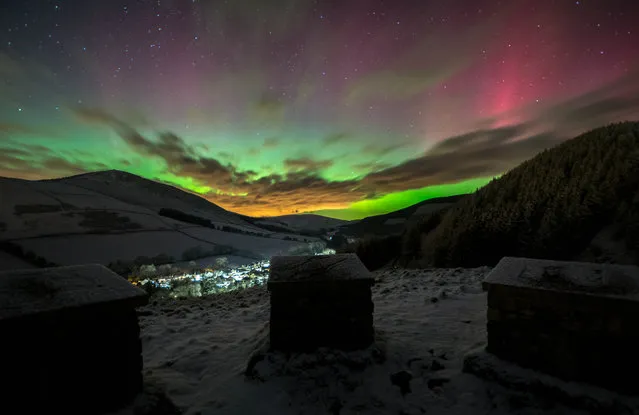 While the Town Sleeps, Innerleithen, UK. The photographer had witnessed the aurora this far south only once before, but this instance was much more intense and vivid than the previous sighting. Using the viewpoint of an old Roman hill fort above the sleeping town below, the photographer captured the aurora’s rare occurrence in that part of Scotland. The low cloud, lit orange by the city lights of Edinburgh in the distance, adds to the variety of colour and contrast of the image. (Photo by Ross Campbell/National Maritime Museum)