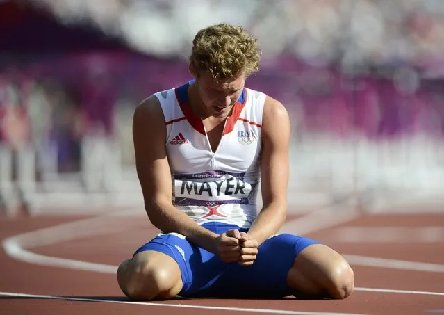 France's Kevin Mayer reacts after his men's decathlon 110m hurdles heat during the London 2012 Olympic Games at the Olympic Stadium August 9, 2012. (Photo by Dylan Martinez/Reuters)