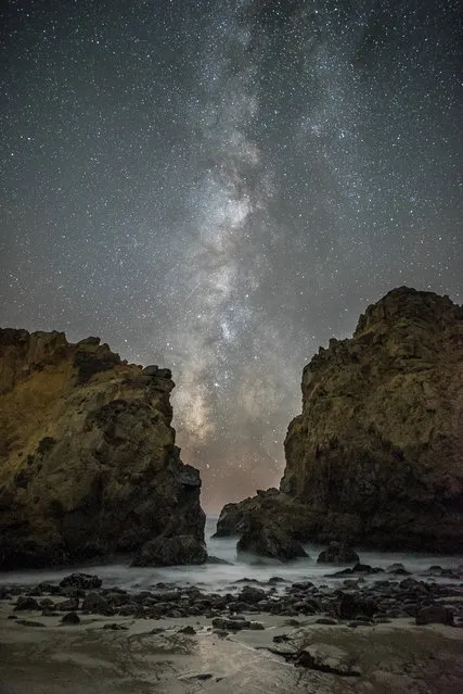 “Between the Rocks”. Our galaxy, the Milky Way, stretches across the night sky between two of the imposing rocks at Pfeiffer State Beach, near Big Sur, California. (Photo by Rick Whitacre/Royal Observatory Greenwich’s Astronomy Photographer of the Year 2016/National Maritime Museum)