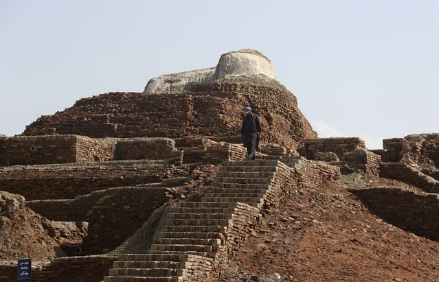 Ruins at Mohenjo Daro, a UNESCO World Heritage Site, in Mohenjo Daro, suffered damage from heavy rainfall, in Larkana District, of Sindh, Pakistan, Tuesday, September 6, 2022. The rains now threaten the famed archeological site dating back 4,500 years. The flooding has not directly hit Mohenjo Daro but the record-breaking rains have inflicted damage on the ruins of the ancient city, said Ahsan Abbasi, the site's curator. (Photo by Fareed Khan/AP Photo)