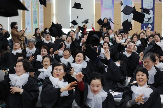Elderly graduates throw their caps during a graduation ceremony at Evergreen School, in Seoul's Yeongdeungpo Ward, South Korea, 22 January 2025. The school, run by the Yeongdeungpo municipality, offers elementary and middle school courses to nontraditional students with an average age of 70 who have not received regular education. (Photo by Yonhap/EPA/EFE)