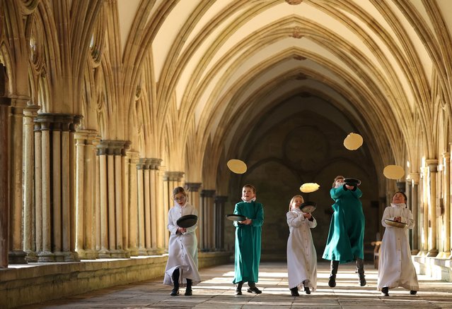 Probationer choristers of Salisbury Cathedral Choir practice flipping pancakes ahead of Shrove Tuesday at Salisbury Cathedral, Salisbury, Britain, on March 3, 2025. (Photo by Toby Melville/Reuters)