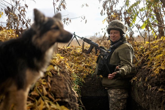 Ukrainian serviceman Valerii looks on at a position in a frontline, amid Russia's attack on Ukraine, in Mykolaiv region, Ukraine on October 26, 2022. (Photo by Valentyn Ogirenko/Reuters)