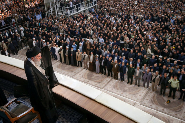 Iran's Supreme Leader Ayatollah Ali Khamenei waves during the 36th anniversary of the death of the leader of Iran's 1979 Islamic Revolution, Ayatollah Ruhollah Khomeini, at Khomeini's shrine in southern Tehran, Iran on June 4, 2025. (Photo by Office of the Iranian Supreme Leader/WANA (West Asia News Agency)/Handout via Reuters)