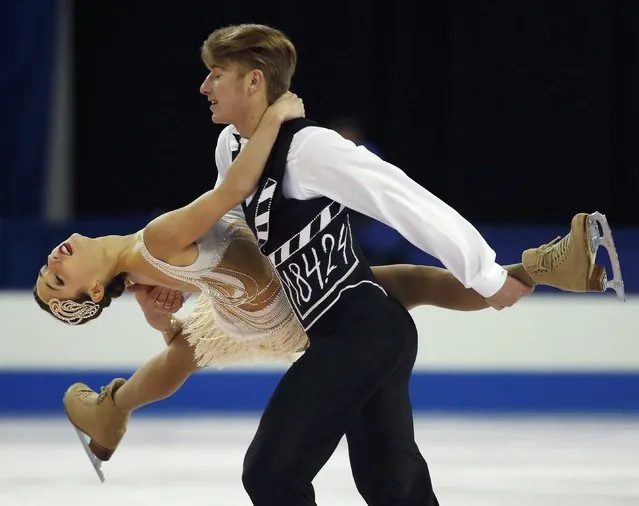 Kristina Astakhova and Alexei Rogonov of Russia perform during the Pairs short program at the Skate America figure skating competition in Milwaukee, Wisconsin October 23, 2015. (Photo by Lucy Nicholson/Reuters)
