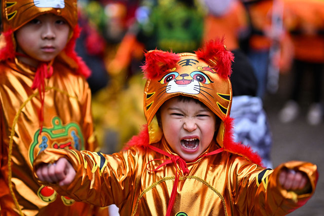Members of the Scottish Chinese community take part in Edinburgh Chinese New Year Festival on January 30, 2022 in Edinburgh, Scotland. 2022 marks the Chinese Year of the Tiger, Chinese New Year in Edinburgh has become one of the largest celebrations of its kind in Scotland. (Photo by Jeff J. Mitchell/Getty Images)