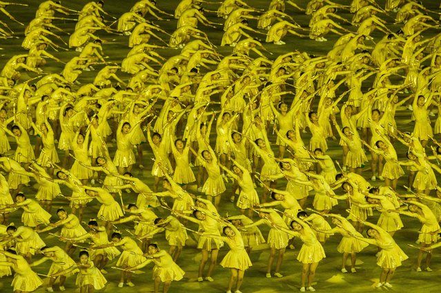 Participants take part in the "Long Live the Workers' Party of Korea" performance to celebrate the 80th founding anniversary of the Workers' Party of Korea at the May Day Stadium in Pyongyang on October 9, 2025. (Photo by Kim Won Jin/AFP Photo)