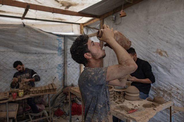 Palestinian potters work at a workshop in Al-Zawaida, central Gaza Strip, 09 December 2025. Following a ceasefire between Israel and Hamas, the pottery industry in Gaza, largely reduced to rubble after two years of conflict, is showing signs of revival, with displaced Palestinian potters establishing a new mud-brick workshop in Al-Zawaida. (Photo by Haitham Imad/EPA)