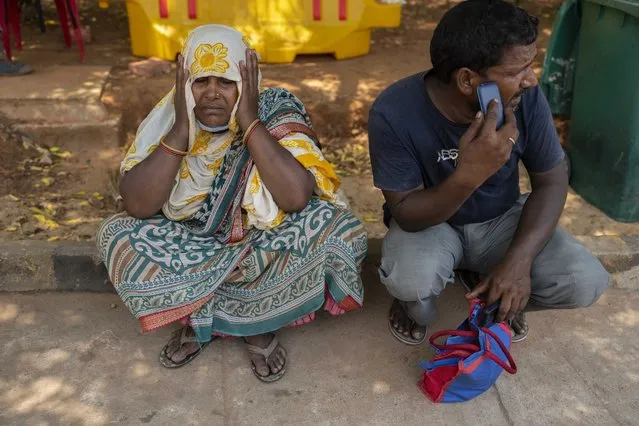 Jenima Mondal, left. whose son Mamjur Ali Mondal died in Friday's train accident mourns at the All India Institute of Medical Sciences hospital in Bhubaneswar in the eastern state of Orissa, India, Monday, June 5, 2023. Families of the victims of India's deadliest train crash in decades filled the hospital on Monday to identify and collect bodies of relatives, as railway officials recommended the country's premier criminal investigating agency to probe the crash that killed 275 people. (Photo by Rafiq Maqbool/AP Photo)