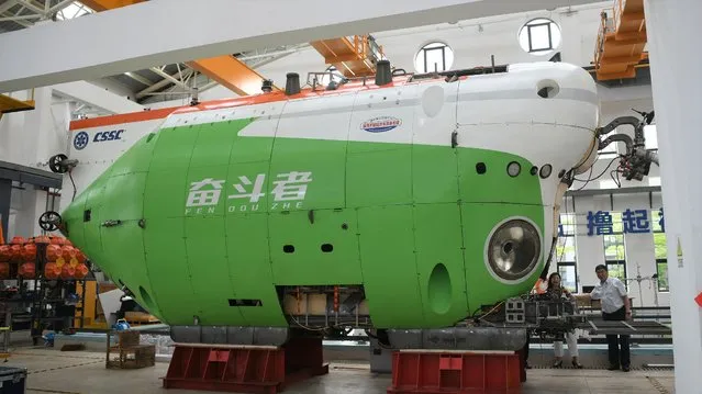  China's deep-sea manned submersible Fendouzhe is delivered to Institute of Deep-sea Science and Engineering under the Chinese Academy of Sciences on March 16, 2021 in Sanya, Hainan Province of China. (Photo by Sha Xiaofeng/VCG via Getty Images)
