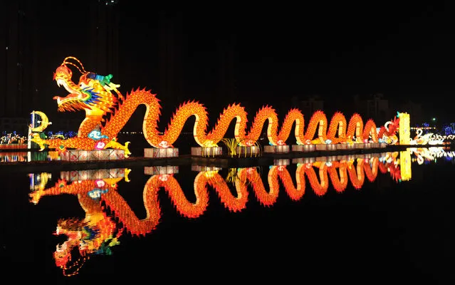 A lantern installation of a dragon is displayed during a lighting test ahead of the park's lantern festival, in Nanchang, Jiangxi Province, China, January 19, 2016. (Photo by Reuters/Stringer)