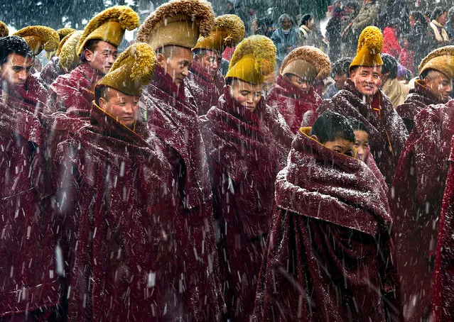 Longing Xie, China. Shortlisted, Open Competition, Arts and Culture. Two five year Chinese New Year, gannan Tibetan autonomous prefecture, gansu province LangMu temple, as will start, a heavy snow falling from the sky, the monks look different. (Photo by Longing Xie/Sony World Photography Awards)