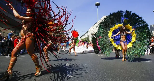 Dancers take part in the Karneval der Kulturen (Carnival of Cultures) street parade of ethnic minorities, in Berlin, Germany, May 24, 2015. (Photo by Hannibal Hanschke/Reuters)