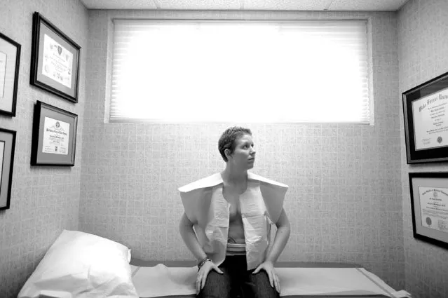 U.S. Air Force Master Sergeant Keri Whitehead waits for a post surgery exam at her plastic surgeon’s office on March 31, 2011 in Charleston, South Carolina. (Photo by Air Force Master Sgt. Jeremy Lock/DMA Deployed)