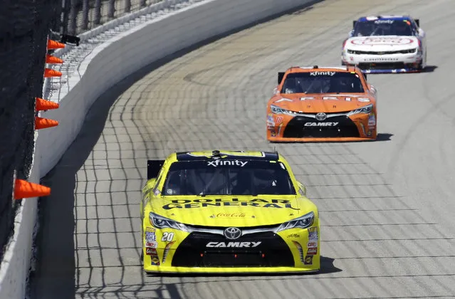 Ross Kenseth (20) leads during the NASCAR Xfinity series auto race at Chicagoland Speedway, Sunday, June 21, 2015, in Joliet, Ill. (AP Photo/Nam Y. Huh) 