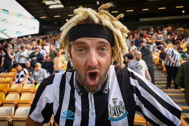 A Newcastle United fan at at Carrow Road wearing his wig in support of recent signing, Allan Saint-Maximin on August 17, 2019. (Photo by Richard Calver/Rex Features/Shutterstock)